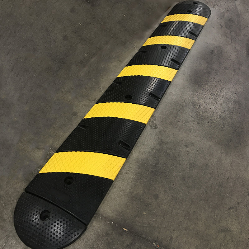 Rubber speed bump, recycled rubber, 6 ft long X 12 wide 2.5 high.